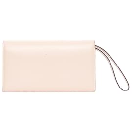 Christian Louboutin-Pochette portefeuille à clous Macaron spike de Christian Louboutin-Rose
