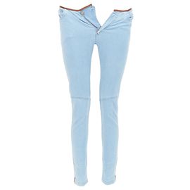 Jeans skinny com acabamento em couro de cordeiro monograma LV da Louis Vuitton Azul