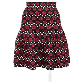 Falda mini estampada floral Alaïa en algodón negro Roja
