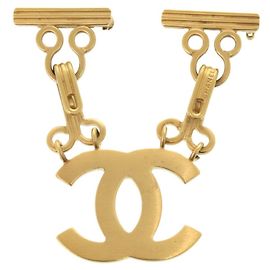 Spilla in oro Chanel Coco Mark D'oro