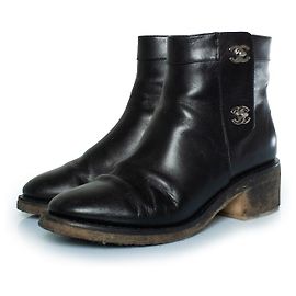 Chanel, Black leather ankle boots with CC turnlocks Black