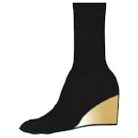 Paco Rabanne Botas pretas curtas com base dourada Preto