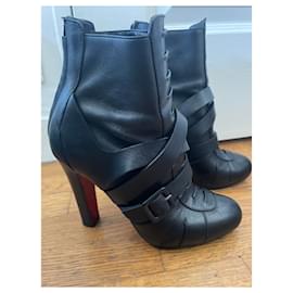 Autre Marque-Black heeled ankle boots with belt strap Christian Louboutin-Other