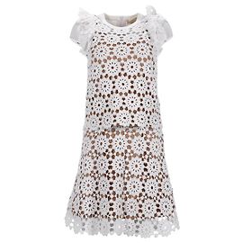 Top sem mangas de renda floral e saia mini em algodão branco da Michael Kors Branco Cru