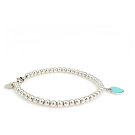 Tiffany & Co-Pulseira charm azul e prata Tiffany & Co.-Prata,Azul