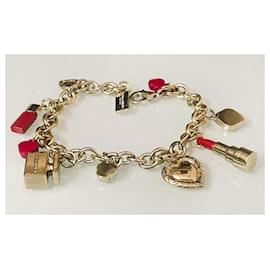 Dolce & Gabbana-Delicious DOLCE & GABBANA bracelet in gold-plated steel with charms.-Golden
