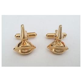 Autre Marque-Excellent condition - Salvador Dali cufflinks-Golden,Gold hardware