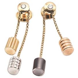 Boucheron Orecchini Quatre in oro 18K Metallico