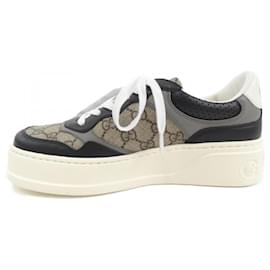 Gucci-Tênis Gucci pretos e marrons-Marrom,Preto