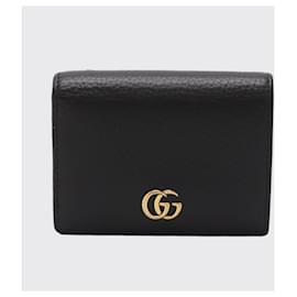Gucci-Carteira bi-fold Petit GG Marmont da Gucci-Preto