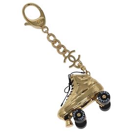Charm de patines CHANEL en metal dorado CC Auth bs23306A Dorado