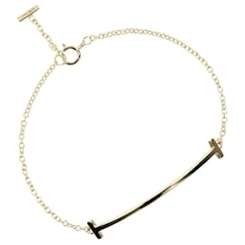 Tiffany & Co-Pulseira charm T Smile da Tiffany & Co.-Outro