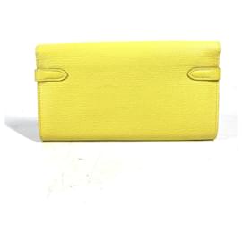 Hermès-Portefeuille Long Kelly Hermes en cuir Chèvre jaune-Jaune
