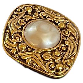 broche Chanel vintage Dourado