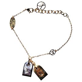Bracelet Louis Vuitton Nanogram bicolore en métal doré Doré