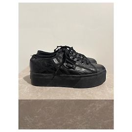 Alaïa Baskets ALAIA T.EU 38 en cuir Noir