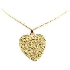Motivo a forma di cuore Saint Laurent D'oro