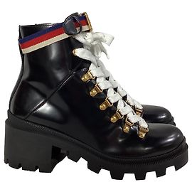 Gucci Trip Kampfstiefel mit Lug-Sohle aus schwarzem Leder Schwarz