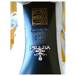 Prada-PRADA LEATHER ANKLE BOOTS WITH FRINGES.-White