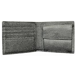 Gucci-Carteira bifold Maxi GG de couro Gucci-Preto