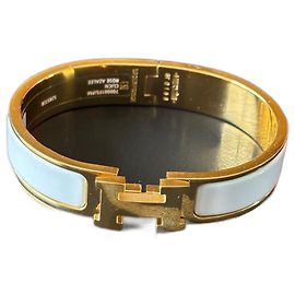 Pulseira Hermès Clic H branca e dourada de aço Branco Dourado