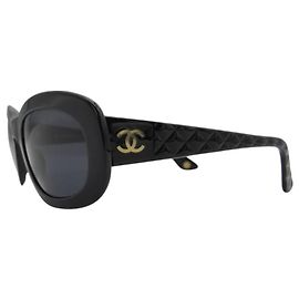 Óculos de sol Chanel pretos acolchoados com logo CC dourado 5009 Preto Dourado