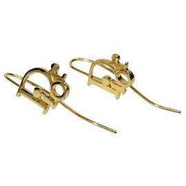 Pendientes de aro dorados con logo de Christian Dior Dorado