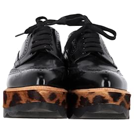 Prada-Prada Leopard Print Pony Hair Platform Brogues in Black Leather-Black