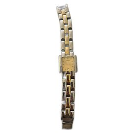 Montre Fred en acier doré et argenté Doré