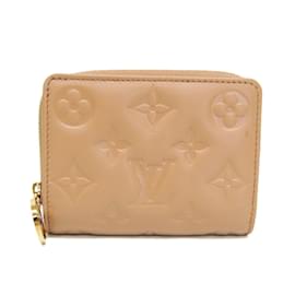 Portafoglio Lou in pelle Monogram embossé Louis Vuitton Cammello