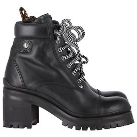 Botas de combate con suela dentada Miu Miu en cuero negro Negro