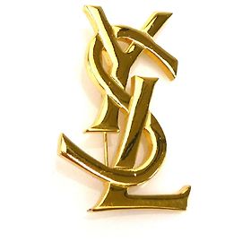 Broche de metal dourado Yves Saint Laurent Dourado