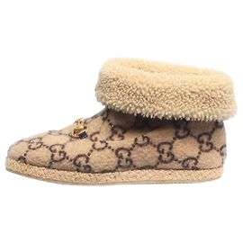 Gucci Botines de shearling con monograma marrón - talla UK 6 Castaño