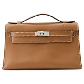 Hermès-Sac à main Pochette Hermes Kelly en cuir Swift doré-Doré