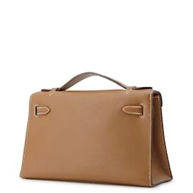 Hermès-Sac à main Pochette Hermes Kelly en cuir Swift doré-Doré