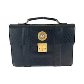 Versace-Bolsa clutch de couro preto com hardware dourado Versace Sunburst-Preto