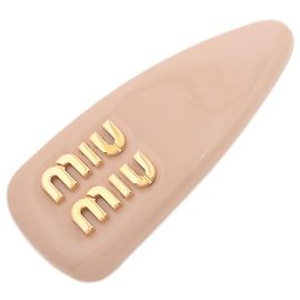 Fermaglio Miu Miu oro e rosa Rosa D'oro
