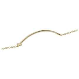Tiffany & Co-Pulseira charm T Smile da Tiffany & Co.-Dourado
