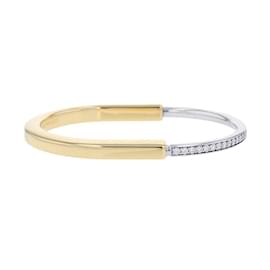Tiffany & Co-Pulseira charm Tiffany em ouro branco e ouro amarelo-Outro