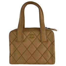 Sac à main Chanel à couture sauvage beige Beige