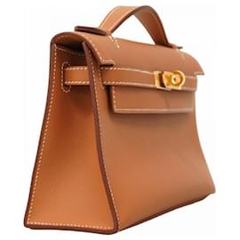 Hermès-Sac à main pochette Hermes Kelly Swift Gold-Doré