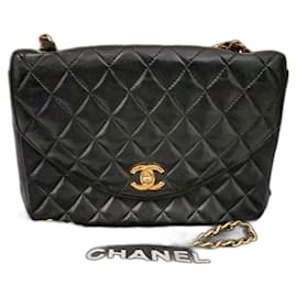 Chanel-Sac à rabat simple Coco Matelassé de Chanel-Noir