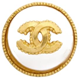 Chanel-Broche plaquée or Chanel avec le logo Coco-Doré