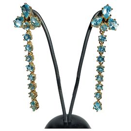 Autre Marque Pendientes largos de topacios azules de oro 18K Otro