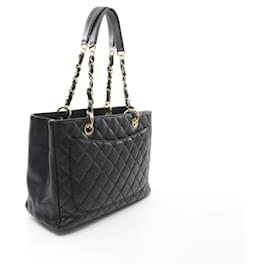 Chanel-Sac de shopping grand modèle en cuir matelassé Chanel A50995-Noir