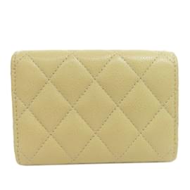 Chanel-Portefeuille bi-fold Matelassé Chanel-Beige