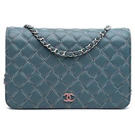 Chanel-Portefeuille Chanel en cuir d'agneau matelassé bleu à double couture avec chaîne-Bleu,Autre