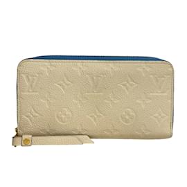 Louis Vuitton-Portefeuille long en cuir ivoire Louis Vuitton-Écru