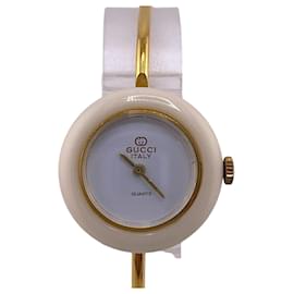 Gucci-Montre pour femmes Gucci Change Bezel-Doré