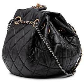 Chanel-Sac seau en cuir d'agneau matelassé noir CC de Chanel avec chaîne à cordon-Noir